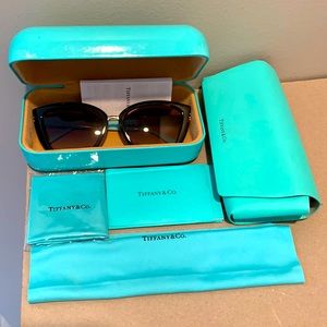 Like NEW Tiffany and Co. sunglasses, cases, clothes.